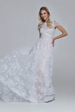 Sparkling wedding dress PEONY. Boat neckline, drop split on the back. Folded skirt.