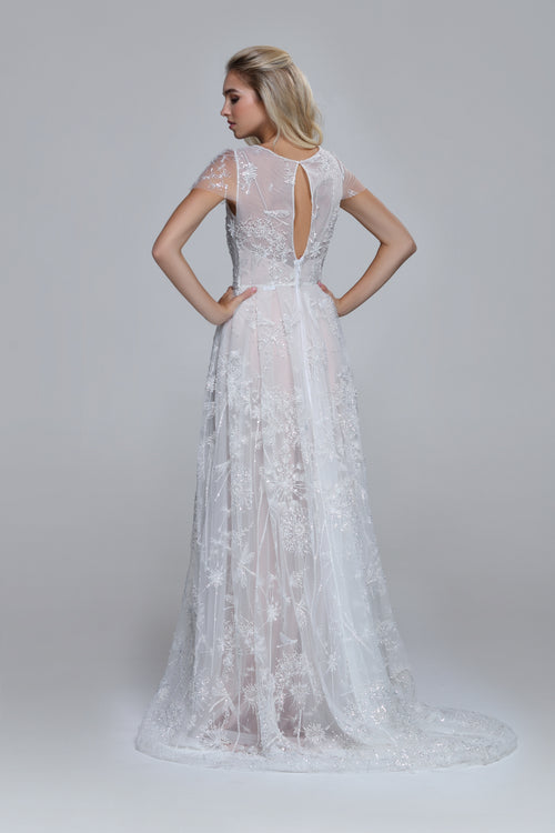 Sparkling wedding dress PEONY. Boat neckline, drop split on the back. Folded skirt.