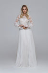 Shiny wedding dress. Beaded top with silk tulle skirt. Boat neckline open back.